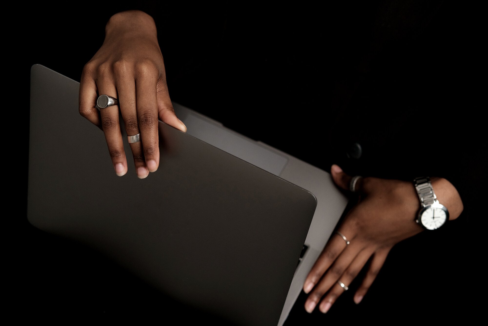 Woman Closing the Laptop